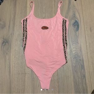 RARE O mighty pink cheetah body suit
